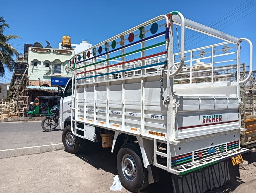 Rear view of the Al-Qaswa Transports vehicle showing its all-South-India state permit